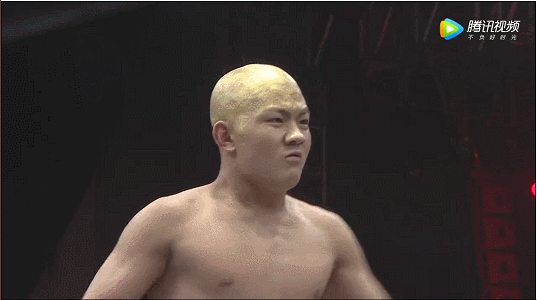 Oriental-Wrestling-Entertainment-OWE-Monk-Little-Vajra-Zhao-Yilong-takes-down-Jack-Manley-with-headbutt.gif